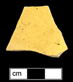 Midlands Yellow, body sherd from indeterminate vessel with colorless lead glaze interior and exterior of buff paste from an unprovenienced site.